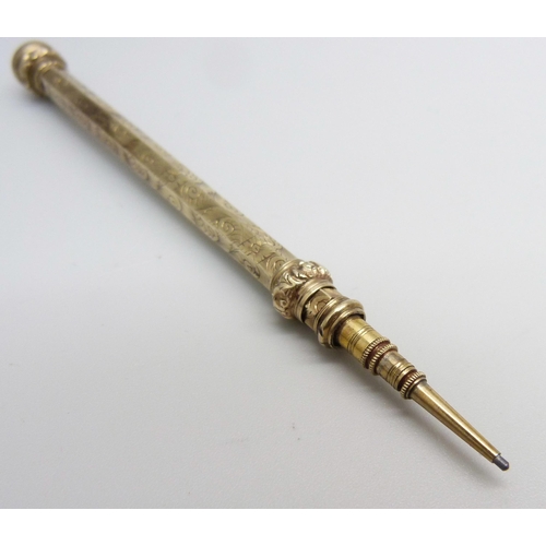 973 - A c1900 yellow metal propelling pencil