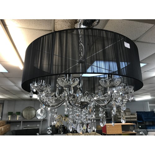 1456 - A chrome eight armed chandelier with black shade