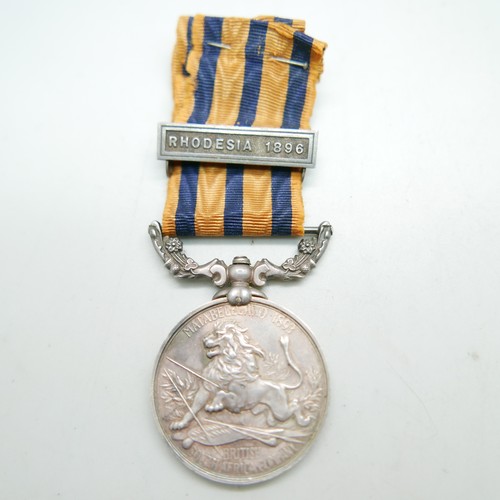 895 - A British South Africa Company Medal with 1896 clasp, loose on ribbon to Victoria Column, name erase... 