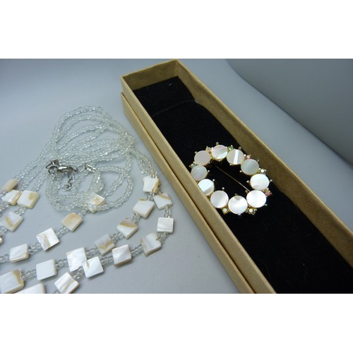 950 - A string of pearls and other mother of pearl set jewellery