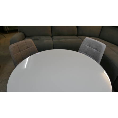 1505 - A Logan circular dining table and four orbit chairs