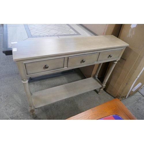 1561 - A three drawer console table