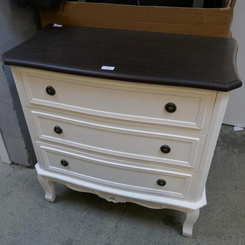 1566 - A chest of drawers with contrast top