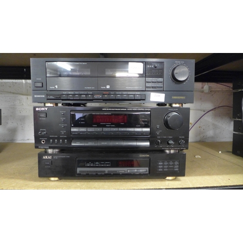 2148 - A Memorex SCT 450 twin cassette tape player, a Sony STR D611 FM stereo receiver and an Akai AT26 qua... 