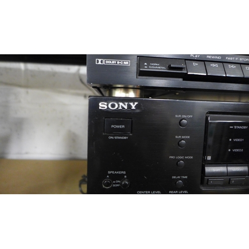 2148 - A Memorex SCT 450 twin cassette tape player, a Sony STR D611 FM stereo receiver and an Akai AT26 qua... 