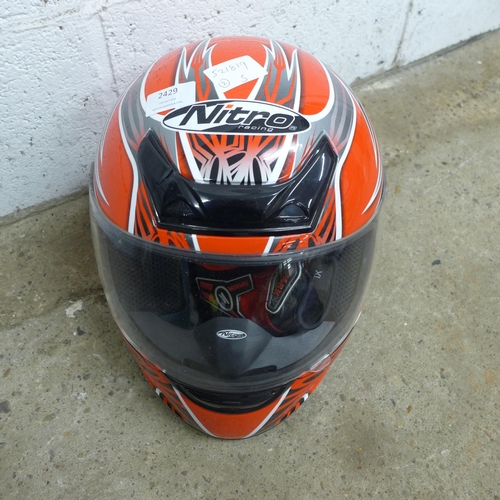 2429 - A set of RST motorcycle leathers and a Nitro Racing helmet