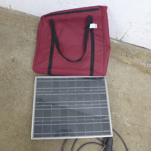 2428 - A portable solar panel in soft case with leads