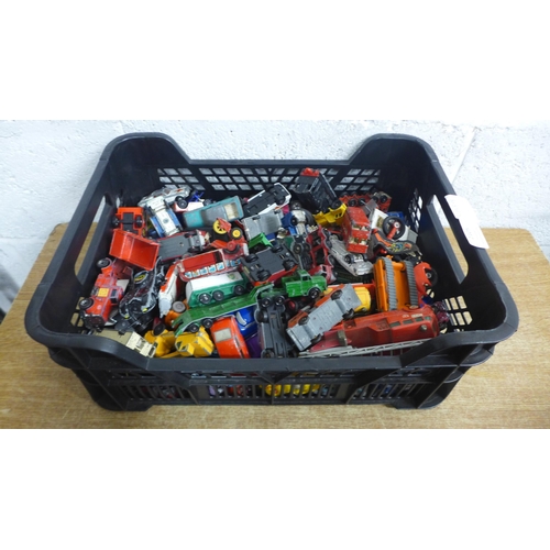 2105 - A box of die-cast model vehicles