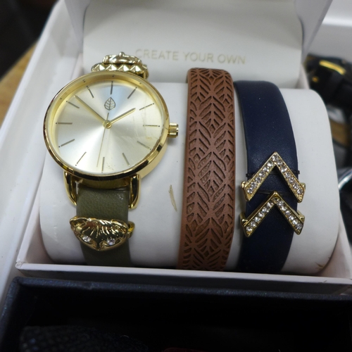 2136 - A box of assorted lady's and gentleman's wristwatches