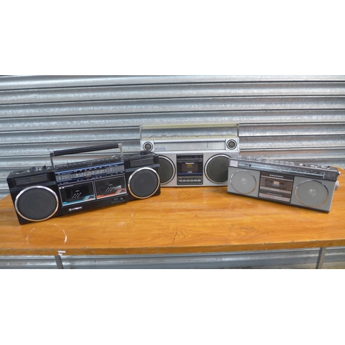 2150 - A Panasonic RX5025L 4-band stereo radio cassette player, a Grundig RCR55 stereo cassette player and ... 