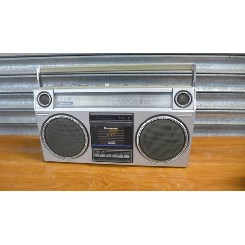 2150 - A Panasonic RX5025L 4-band stereo radio cassette player, a Grundig RCR55 stereo cassette player and ... 