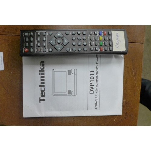 2151 - A Technika X23/50E-BR-FTCDUP 23” LCD TV with integrated DVD player, remote and instructions - W