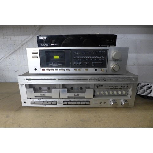 2166 - A Sony SVR HDT500 Twin Tuner hard disc receiver, a Pioneer stereo cassette receiver and a Sharp SC70... 