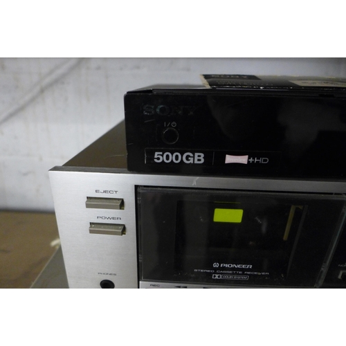 2166 - A Sony SVR HDT500 Twin Tuner hard disc receiver, a Pioneer stereo cassette receiver and a Sharp SC70... 