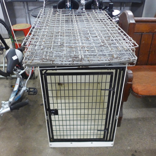 2210 - A dog cage and a Lintran transit box