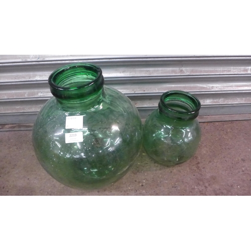 2219 - A set of two vintage green glass terrarium carboy jars (one medium sized and one small)