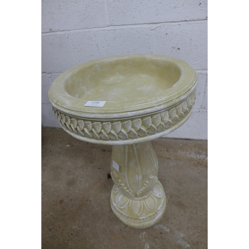 2288 - A sandstone effect concrete two piece bird bath