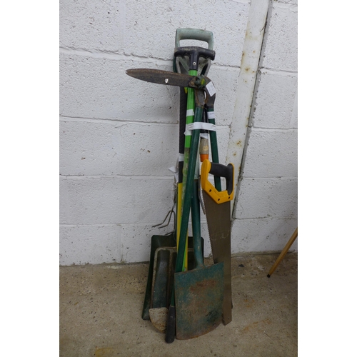 2290 - Two bundles of garden tools, axe, shovel, fork, spade, edger and lawn edgers