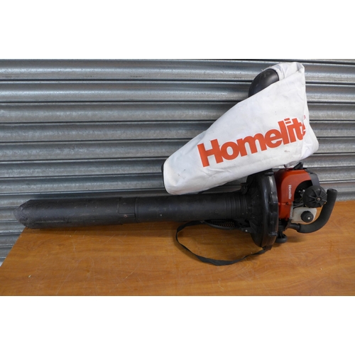 2297 - A Homelite Mighty two stroke petrol blower and a Bosch Easy Trim 240v electric garden strimmer