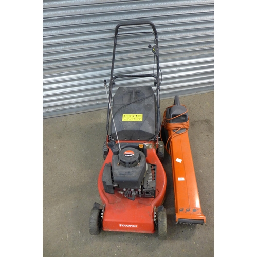 2314 - A Flymo 240v garden vac and a Champion R484P petrol driven lawn mower