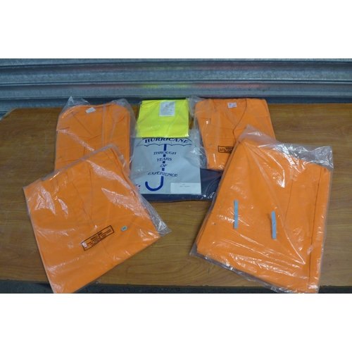 2333 - A box of fluorescent work wear including 4 orange boiler suits, a hi-vis vest and a pair of work tro... 