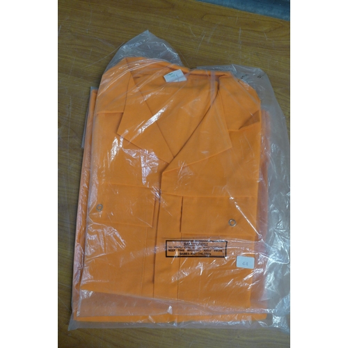 2333 - A box of fluorescent work wear including 4 orange boiler suits, a hi-vis vest and a pair of work tro... 