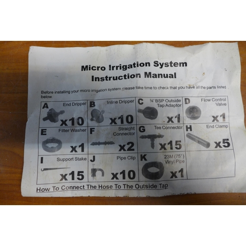 2335 - 2 lots of micro irrigation sets with fittings, a 5m x 1.5m roll of weed control membrane, a Green Bl... 