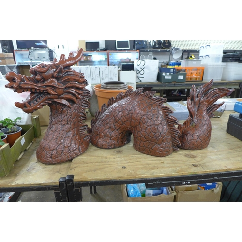 2343 - An oriental concrete three piece dragon garden ornament