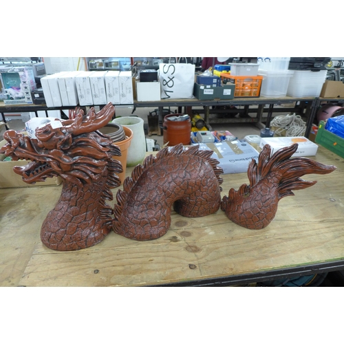 2343 - An oriental concrete three piece dragon garden ornament