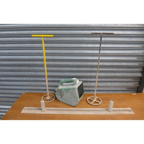 2346 - A Tyrol Tyrolean Flicker machine, a 1.2m plastering float and two plaster mixing tools