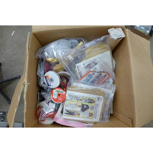 2358 - A box of sewing patterns, a box of material, patterns and haberdashery and 7 A4 sized box files