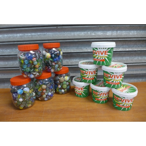 2417 - Five small tubs of marbles and 25 365g tubs of  Revive Power Paste