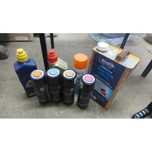 2476 - A can of Bostik Water Seal, motorcycle oil, cans of spray paint, cased set of Wahl hair clippers, le... 