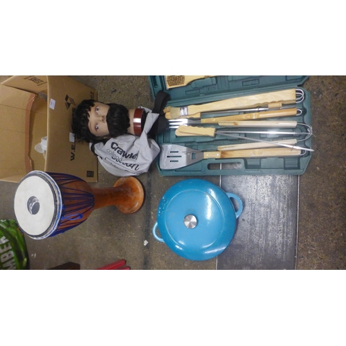 2482 - A quantity of miscellaneous items including a cased BBQ set, bongo drum, Denby cast iron pan and a h... 