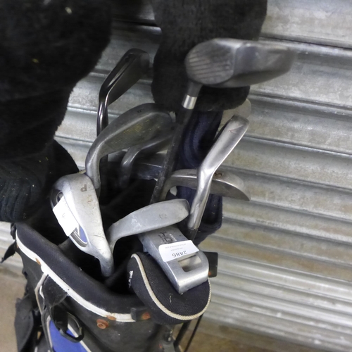 2486 - A set of Dunlop golf clubs and bag