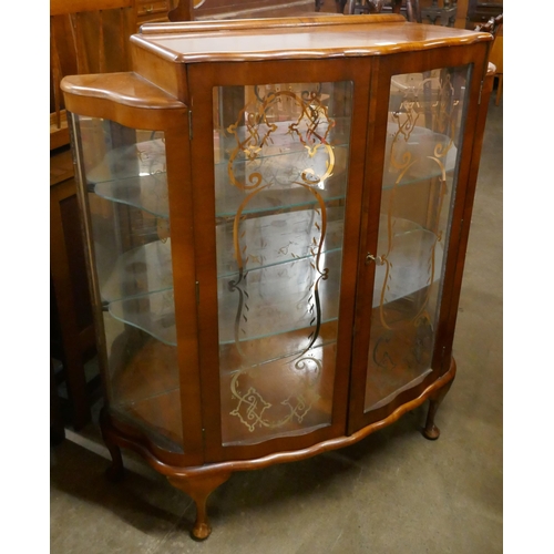 112 - A walnut display cabinet