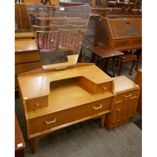 71 - A G-Plan Brandon oak dressing table and bedside cabinet