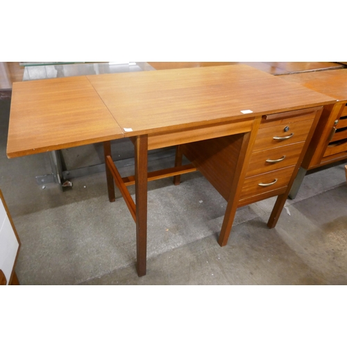 74 - A teak desk