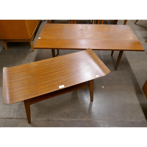 76 - A sleigh top teak coffee table and one other