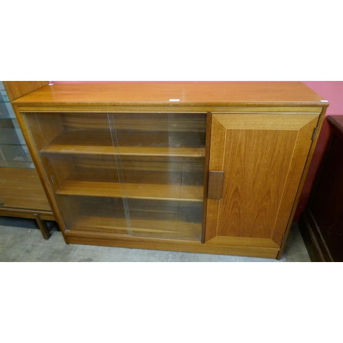 79 - A teak bookcase