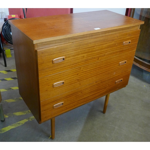 83 - A teak chest of drawers