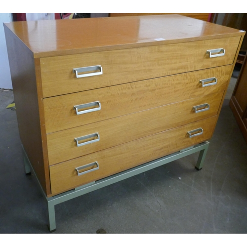 85 - A teak chest of drawers