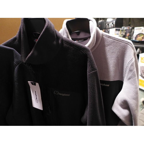 3166 - Four Men's fleeces - Two Berghaus and Two Columbia - Sizes: L & XL *This lot is subject to VAT