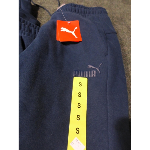 3169 - Four pairs of Men's Marine Blue Puma joggers - Sizes: S & M *This lot is subject to VAT