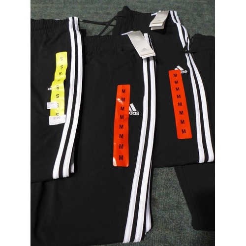 3170 - Four pairs of Men's Black Adidas slim pants - Sizes: S & M *This lot is subject to VAT