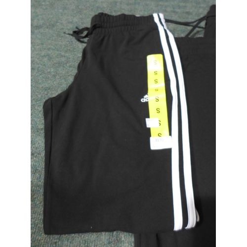 3170 - Four pairs of Men's Black Adidas slim pants - Sizes: S & M *This lot is subject to VAT