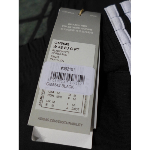 3170 - Four pairs of Men's Black Adidas slim pants - Sizes: S & M *This lot is subject to VAT