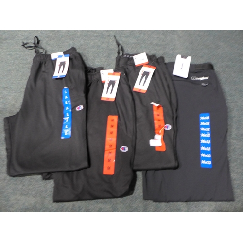 3171 - Four Pairs of Men's Black joggers - Champion and Berghaus - mixed sizes *This lot is subject to VAT