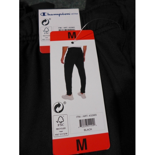 3171 - Four Pairs of Men's Black joggers - Champion and Berghaus - mixed sizes *This lot is subject to VAT