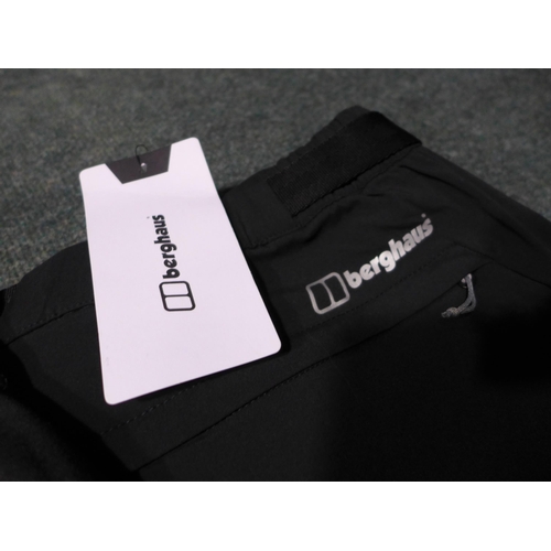 3171 - Four Pairs of Men's Black joggers - Champion and Berghaus - mixed sizes *This lot is subject to VAT